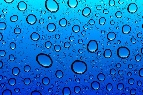 Gotas de agua sobre vidrio —  Fotos de Stock