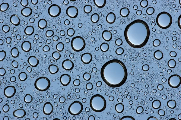 Gotas de agua sobre vidrio — Foto de Stock