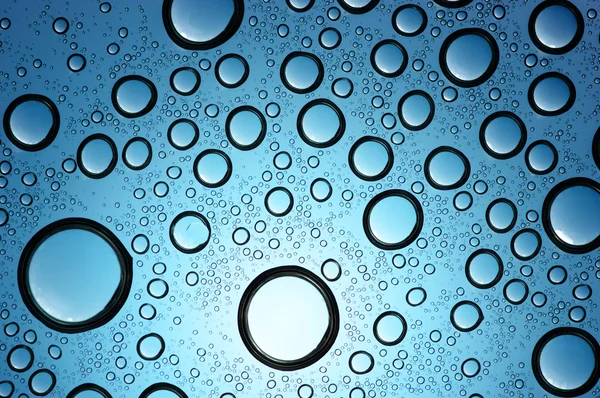 Gotas de agua sobre vidrio —  Fotos de Stock