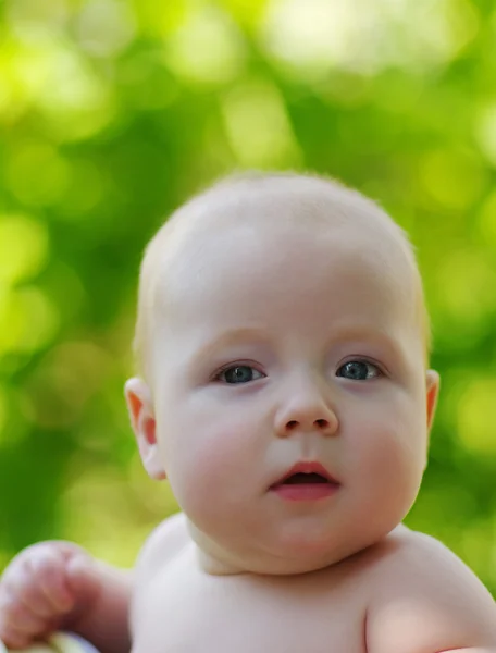 Baby on green — Stock Photo, Image