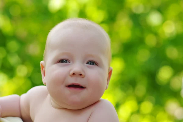 Baby on green — Stock Photo, Image