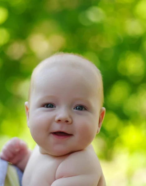 Baby on green — Stock Photo, Image