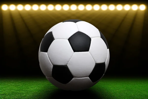 Soccer ball on green stadium — Stock Photo, Image