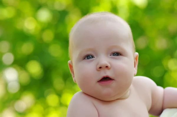 Baby on green — Stock Photo, Image