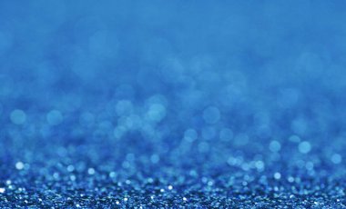Soyut Mavi Bokeh arkaplanı. Parıldayan ışık