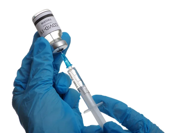 医師の手でガラス瓶の中にコロナウイルスワクチンCovid 19は白い背景に隔離 — ストック写真