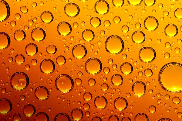 Gotas en el fondo de la cerveza — Foto de Stock