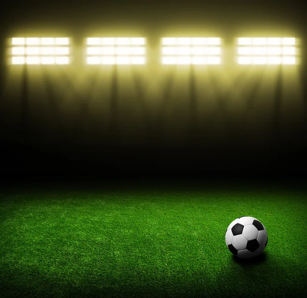 Stadion piłkarski z jasnymi światłami — Zdjęcie stockowe