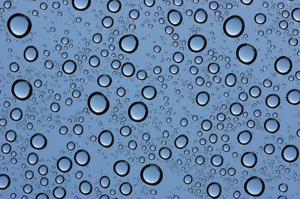 Gotas de agua sobre vidrio — Foto de Stock