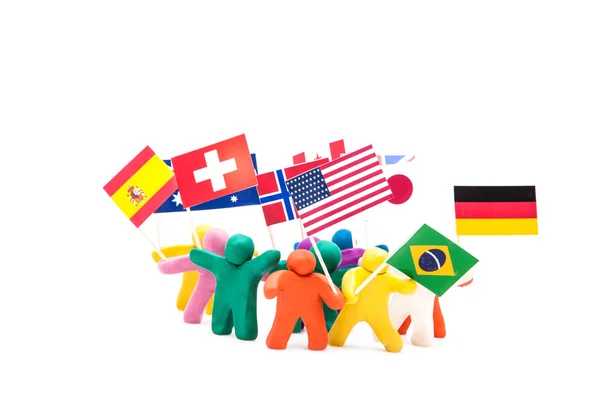 Crowd group of colourful plasticine humans with the various flags — Stock Photo, Image