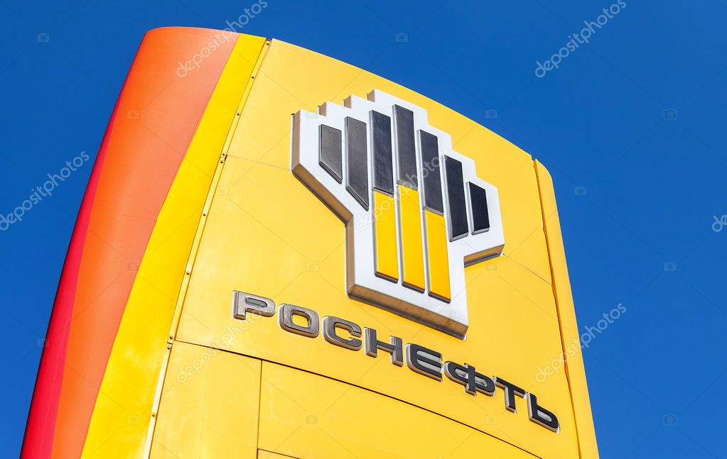 SAMARA, RUSSIA - APRIL 16, 2016: The emblem of the oil company Rosneft against the blue sky background. Rosneft is one of the largest russian oil companies