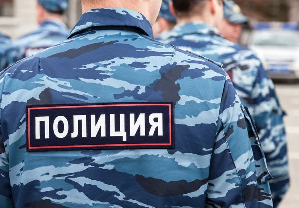Napis "policja" na mundurze rosyjskiej policji — Zdjęcie stockowe