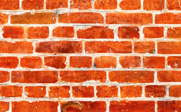 Old weathered grunge red brick wall as background — Stock Photo, Image