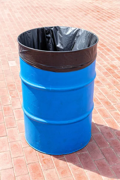 Metal Barrel Plastic Bag Waste City Pavement — Stock Photo, Image