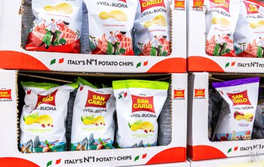 Samara, Russia - June 19, 2021: San Carlo classic potato chips to sale on the shelf in superstore clipart