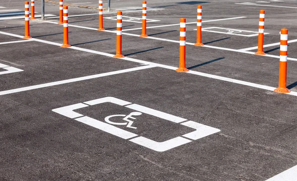 Parking space reserved for handicapped shoppers in a retail park — Stock Photo, Image