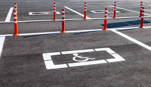 Parking space reserved for handicapped shoppers in a retail park — Stock Photo, Image