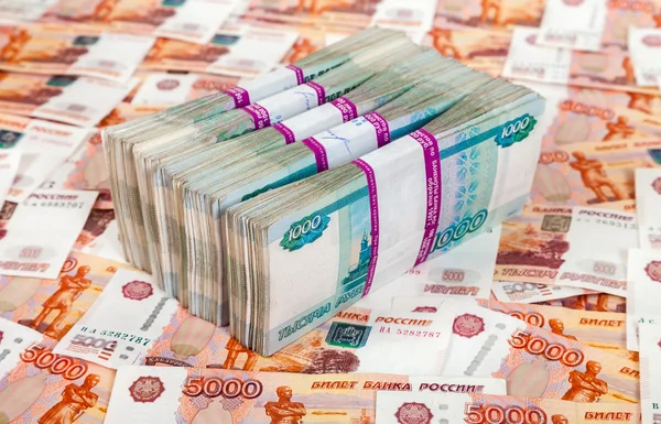 http://st2.depositphotos.com/1000471/5475/i/450/depositphotos_54753707-Russian-rubles-bills-over-money-background.jpg