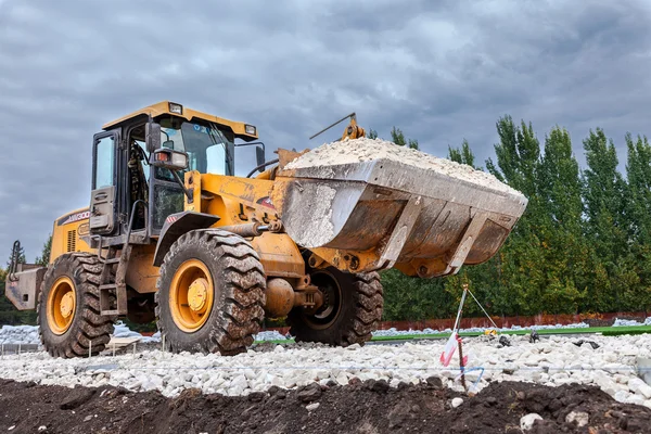 Samara, Rusko - 28 září 2014: buldozer těžké zatížení a — Stock fotografie