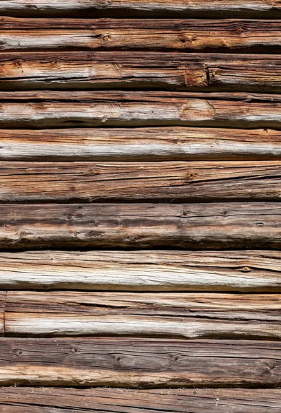 Tronchi di legno muro della vecchia casa rurale sfondo — Foto Stock