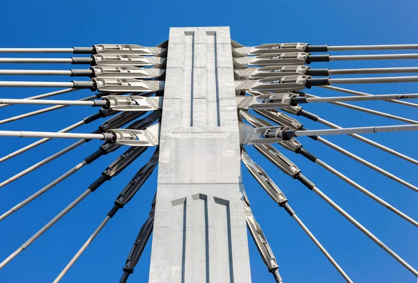 Pillar of cable bridge against blue sky — Stock Photo, Image