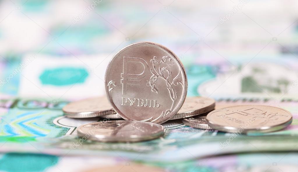 Russian rubles coins and banknotes close up
