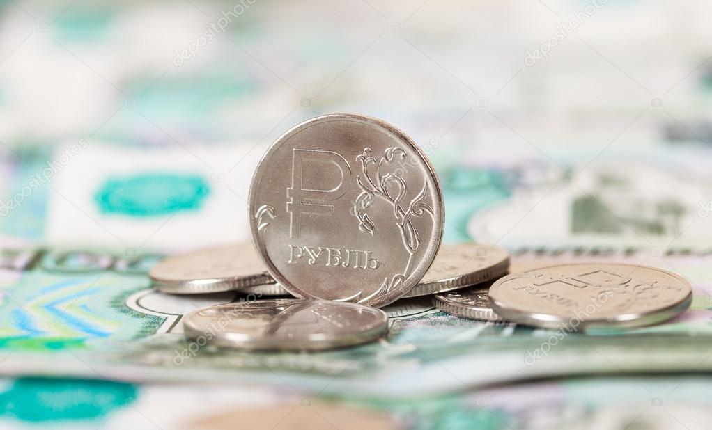 Russian rubles coins and banknotes close up