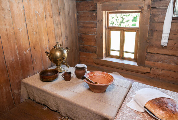 Interior of old rural wooden house in the museum of wooden archi