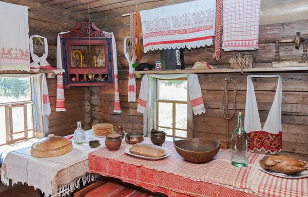 Interior of old rural wooden house in the museum of wooden archi — Stock Photo, Image