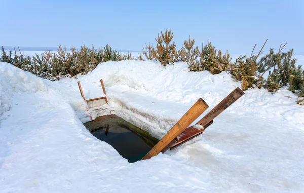 Ice hole for winter swimming at the river — Stock Photo, Image