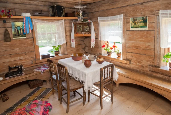 Interior of old rural wooden house in the museum of wooden archi — Stock Photo, Image