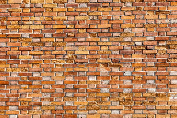 Textura obarvených stará cihlová zeď na pozadí — Stock fotografie