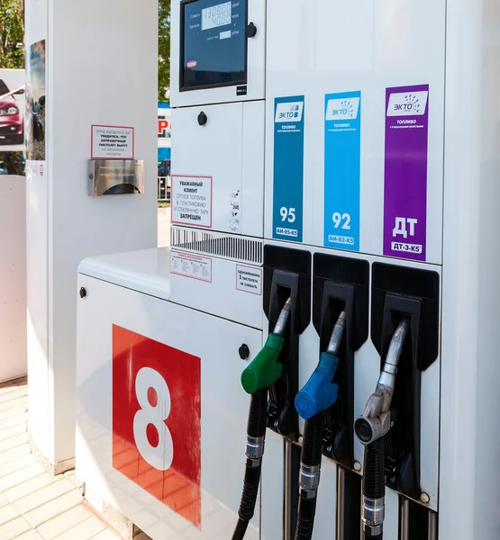 Filling the column with different fuels at the gas station — Stock Photo, Image