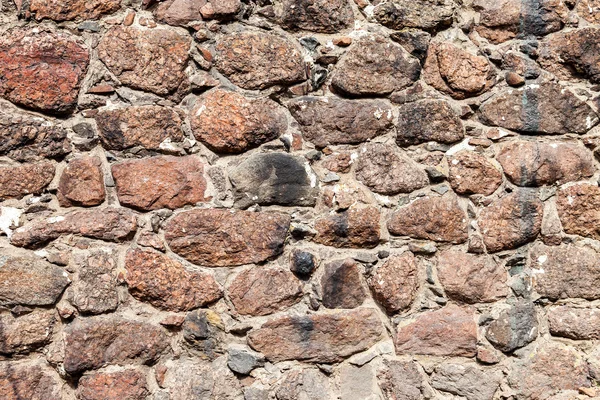Фрагмент старой каменной стены как фон — стоковое фото
