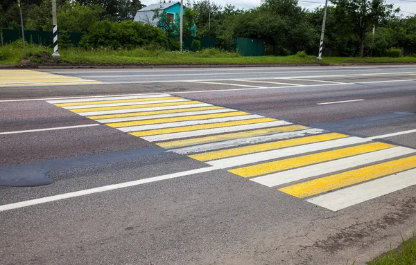Zebra crossing with white and yellow lines — Stock Photo, Image