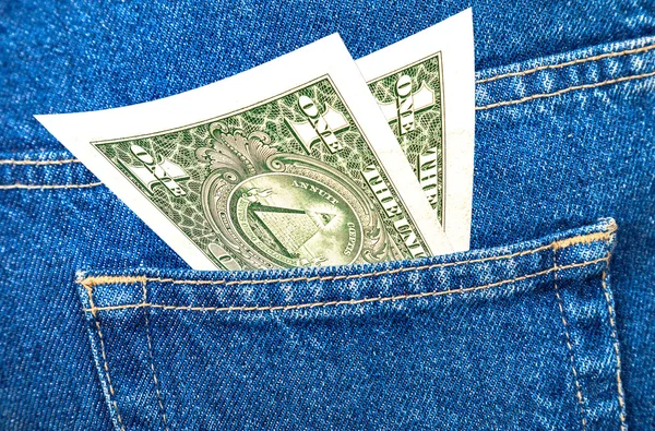 Banknotes of one american dollar sticking out of the back jeans — Stock Photo, Image