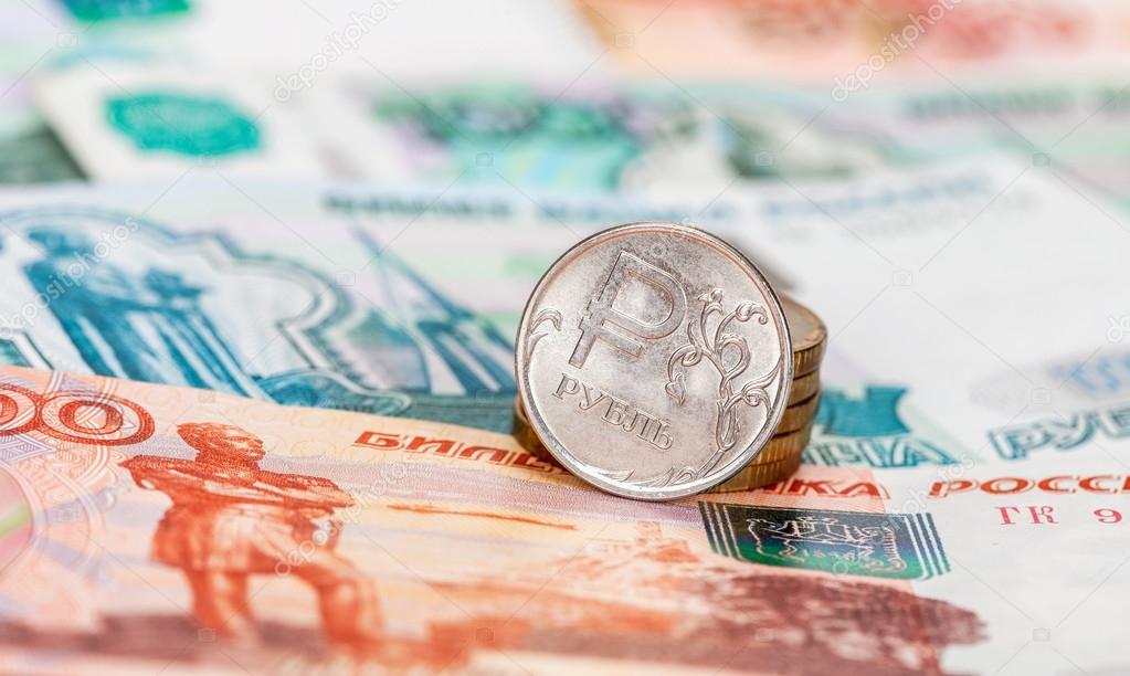 Russian currency, rouble: banknotes and coins close up