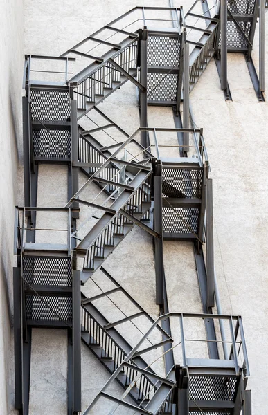 Metal fire stairs on the facade of building — Stock Photo, Image