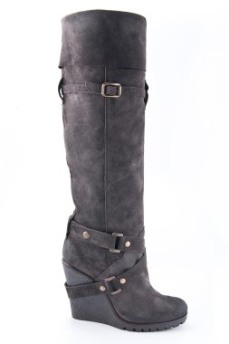 Üzerinde yüksek platform tek kadın kahverengi süet çizmeler