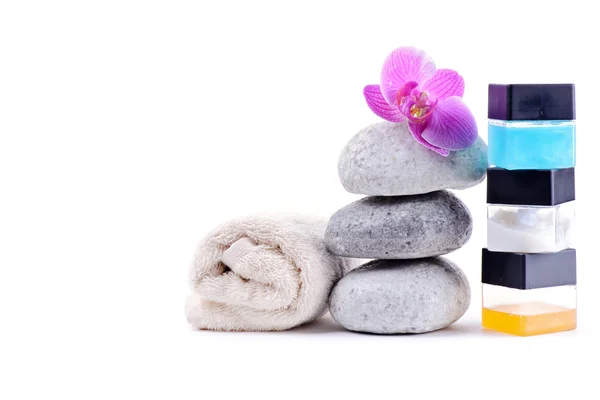 Stack of spa stones with flower — Stock Photo, Image