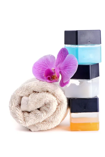 Stack of spa accessories with flower — Stock Photo, Image