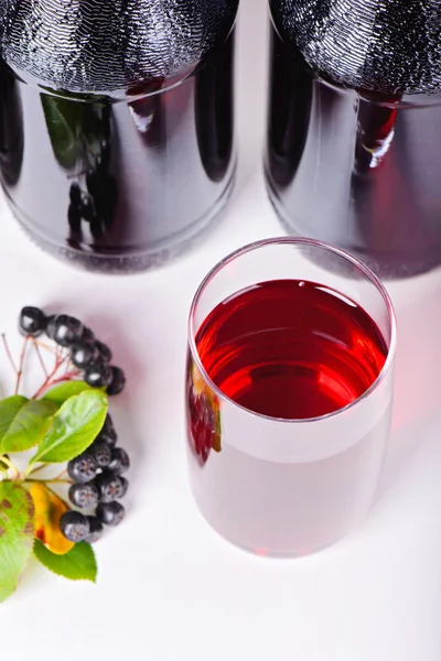 Syrup made from aronia, berries, glass and bottles — Stock Photo, Image