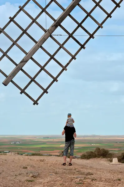 Wooden wing from old windmill and family — Stock Photo, Image