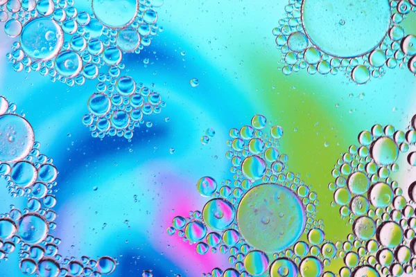 Färgglada abstrakt bakgrund med oljedroppar på vatten — Stockfoto