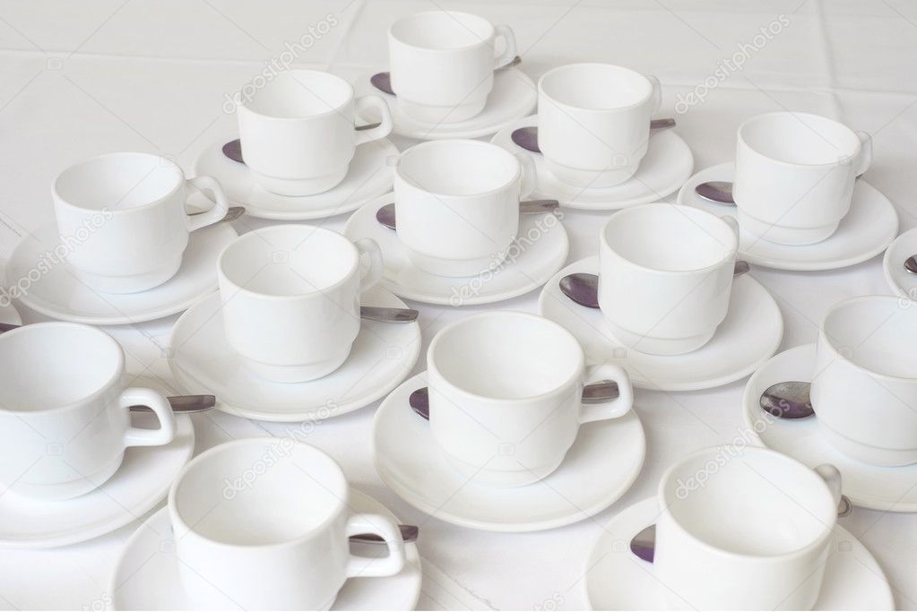 Group of white coffee cups in cafe bar