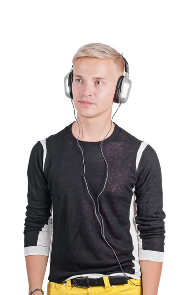 Joven hombre guapo con auriculares — Foto de Stock