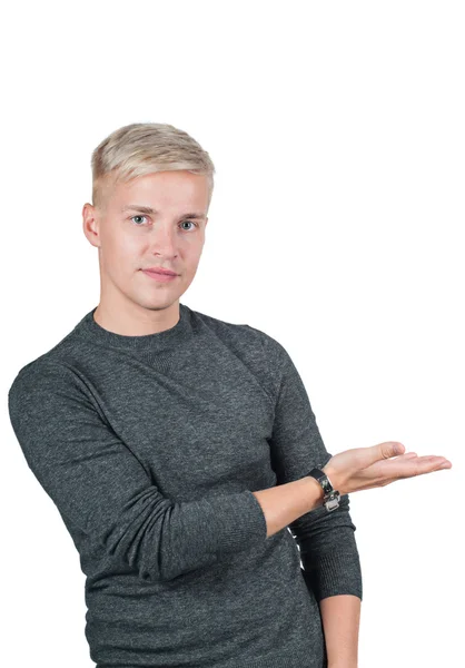 Young handsome guy holding something — Stock Photo, Image