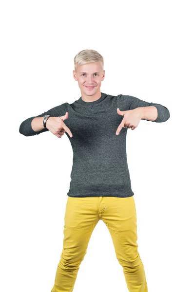 Young handsome guy showing somewhere with fingers — Stock Photo, Image
