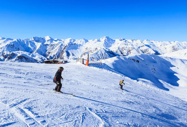 Skiers on the slopes of the ski resort of Meribel, France Stock Photo