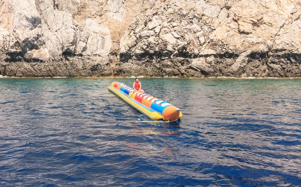 Entertainment at sea: banana. Rhodes Island. Greece — Stock Photo, Image